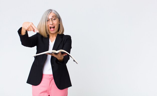 Middle age businesswoman with a notebook