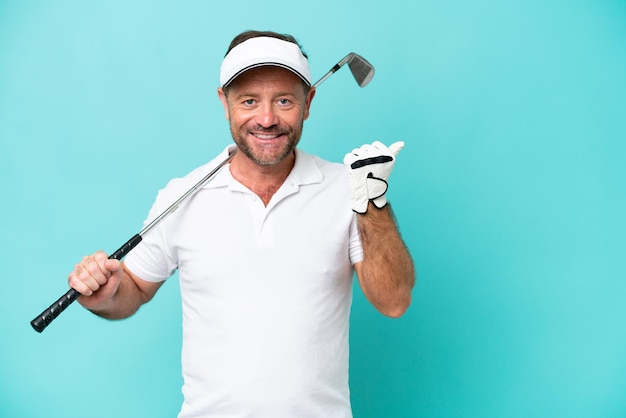 Middle age caucasian golfer player man isolated on blue background pointing to the side to present a product