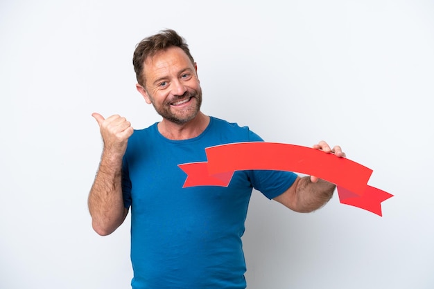 Middle age caucasian man isolated on white background holding an empty placard with thumb up