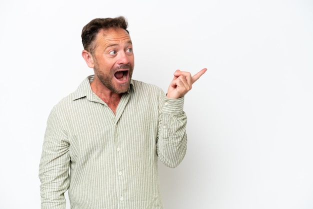 Middle age caucasian man isolated on white background intending to realizes the solution while lifting a finger up