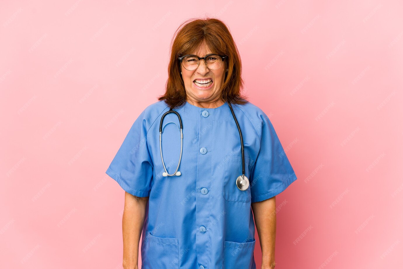 https://img.freepik.com/premium-photo/middle-age-caucasian-nurse-woman-isolated-screaming-very-angry-aggressive_1187-104017.jpg?w=1380