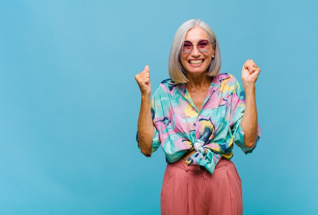 Middle age cool woman with beautiful hair isolated