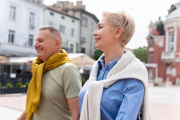 Middle age couple having a date in a sunny day