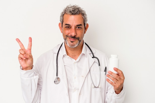 Middle age doctor caucasian man isolated on white background  showing number two with fingers.