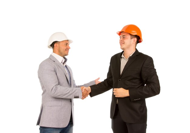 Photo middle age happy client and engineer shaking hands isolated on white background.