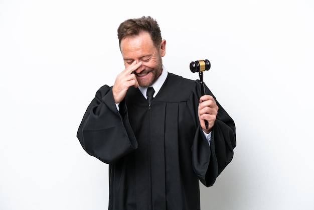 Middle age judge man isolated on white background laughing