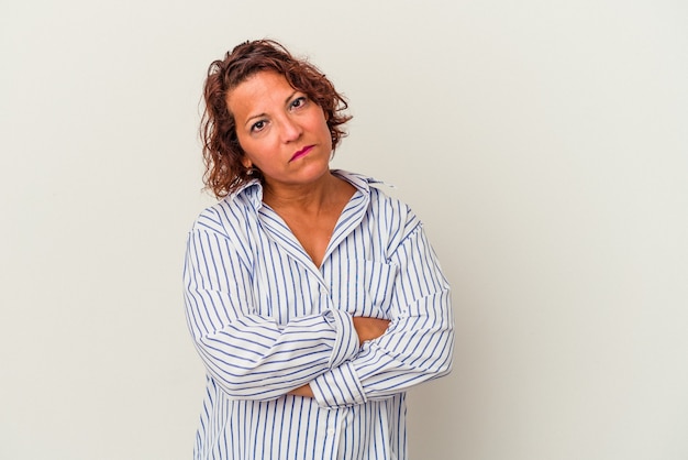 Middle age latin woman isolated on white background who is bored, fatigued and need a relax day.