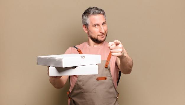 Middle age man chef. take away pizzas concept