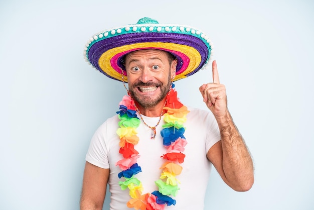 Middle age man feeling like a happy and excited genius after realizing an idea. mexican culture