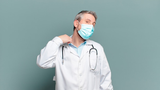 Middle age man physician with a protective mask