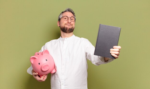 Middle age man with a piggy bank