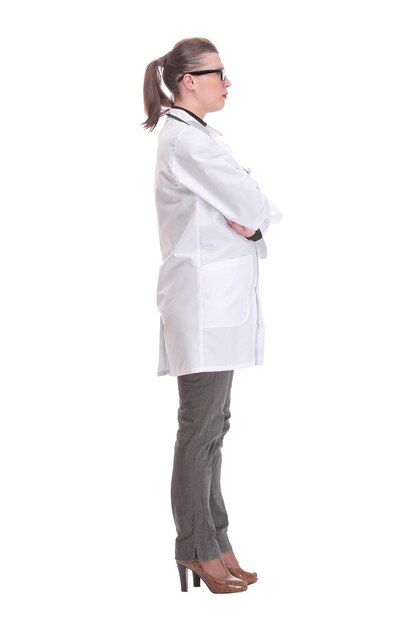 Middle age mature doctor woman wearing medical coat over isolated background smiling looking to the ...