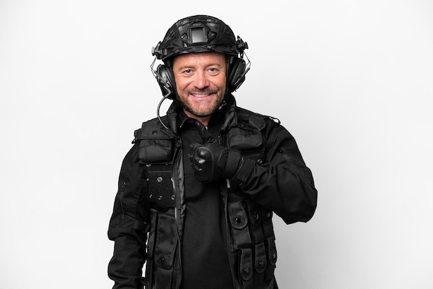 Middle age SWAT man isolated on white background giving a thumbs up gesture