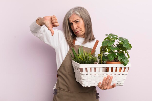 Middle age woman farmer or gardener concept