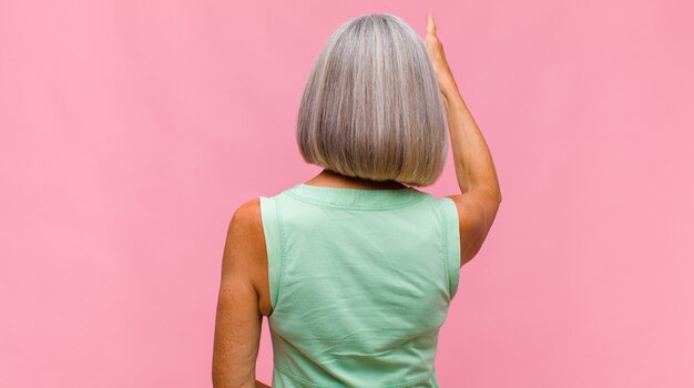 Middle age woman in a green shirt