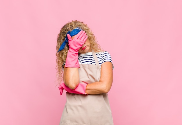 Middle age woman looking stressed, ashamed