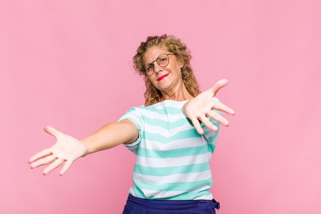 Middle age woman smiling cheerfully