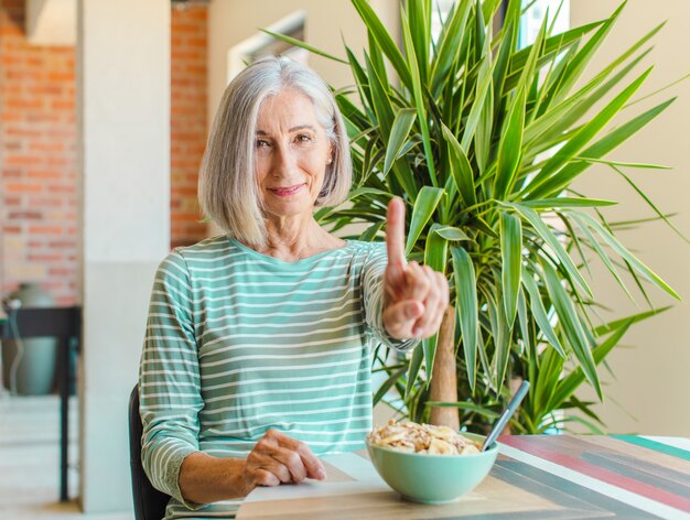 Middle age woman smiling and looking friendly