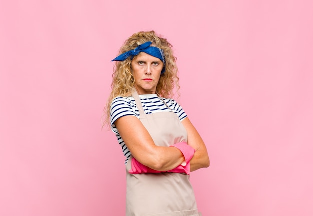 Middle age woman with long curly hair isolated