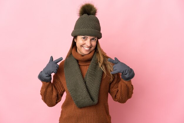 Middle age woman with winter hat isolated