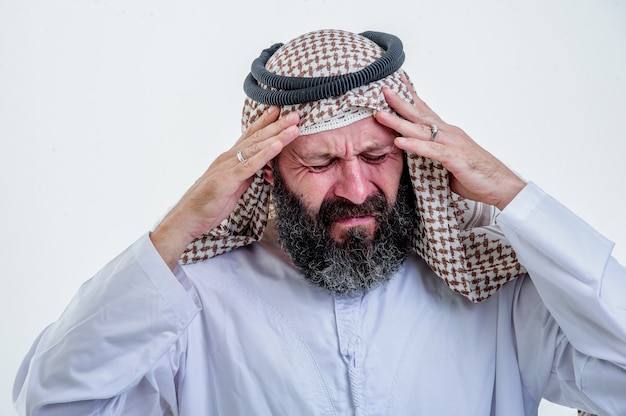 Middle Aged Arab Man having Headache