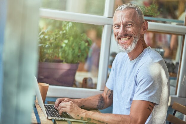 Middle aged caucasian man working on computer