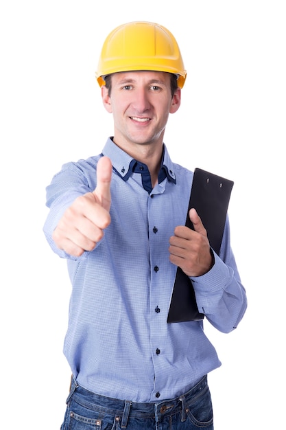 Middle aged handsome business man in yellow builder's helmet thumbs up isolated on white background