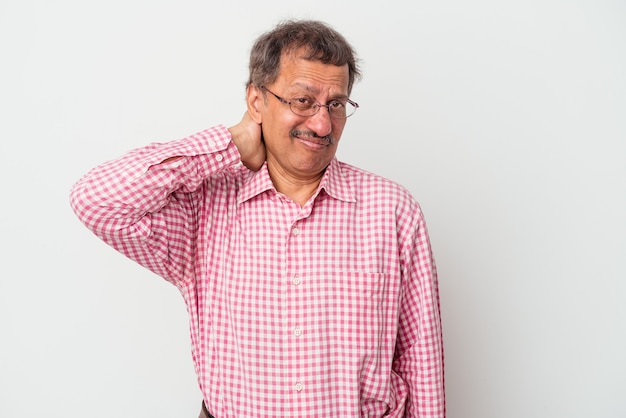 Middle aged indian man isolated on white background touching back of head, thinking and making a choice.