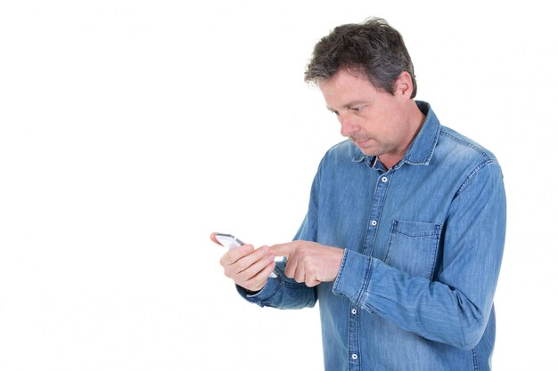 Middle aged man in casual using phone 