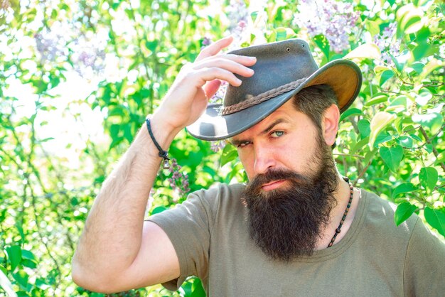 Middle aged man portrait on farmland portrait of handsome man against spring background