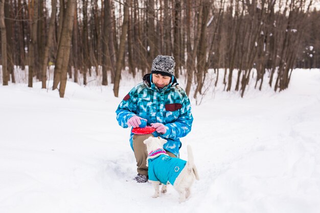 Middle aged woman outdoors with cute dog