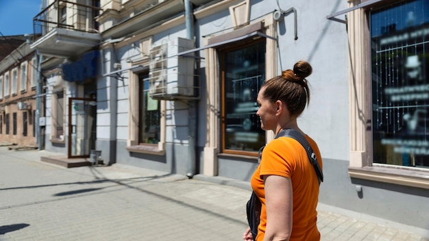 Middle aged woman on a tourist trip in an old European city