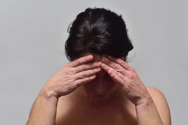 Middle-aged woman with headache