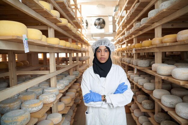 middle eastern black african muslim business woman in local  cheese production company