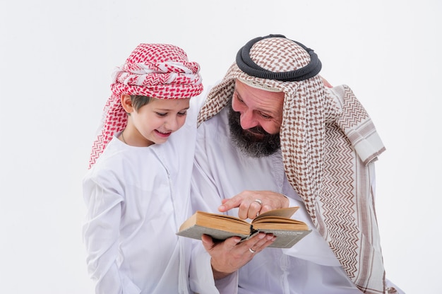 Middle eastern father teaching his son