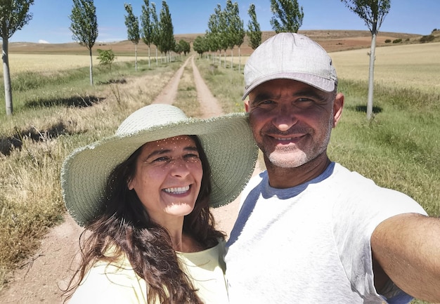 Middleaged couple happy in nature