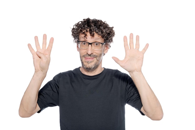 Photo middleaged man making the number eight with his fingers on white background