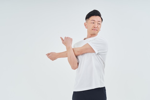 Middleaged man wearing sportswear indoors