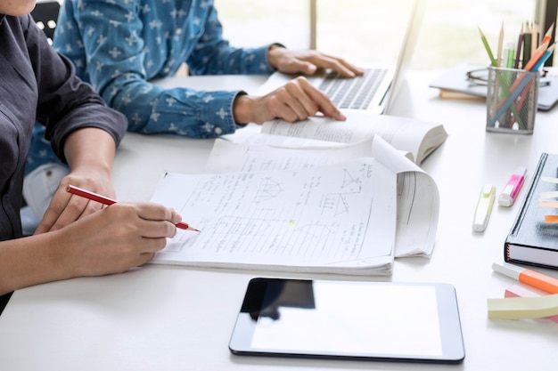 Midsection of business colleagues working in office