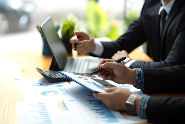 Midsection of business colleagues working at office