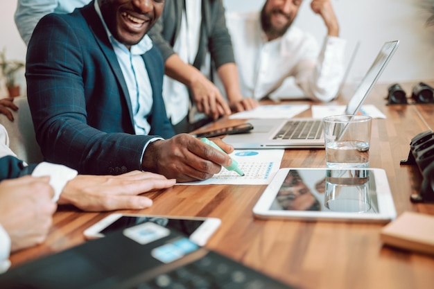 Midsection of business colleagues working at office