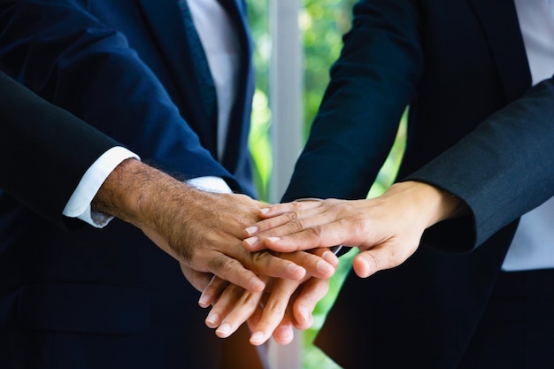 Photo midsection of business people doing hand stack