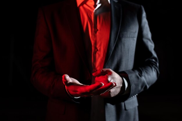 Photo midsection of businessman holding book