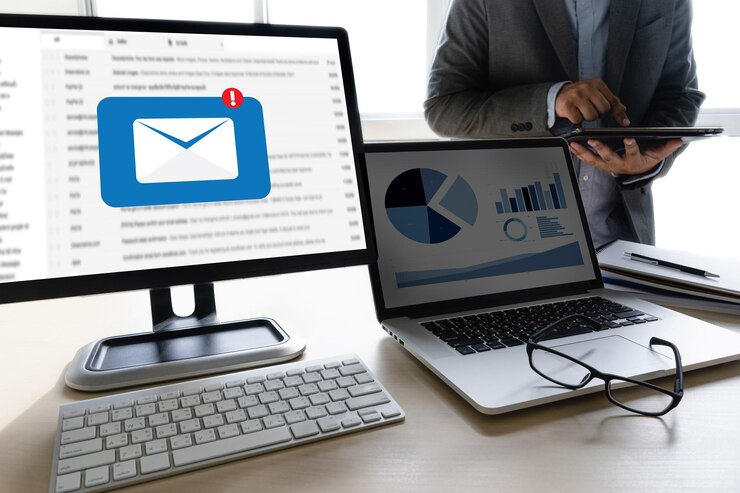 Photo midsection of businessman using digital tablet while standing in office