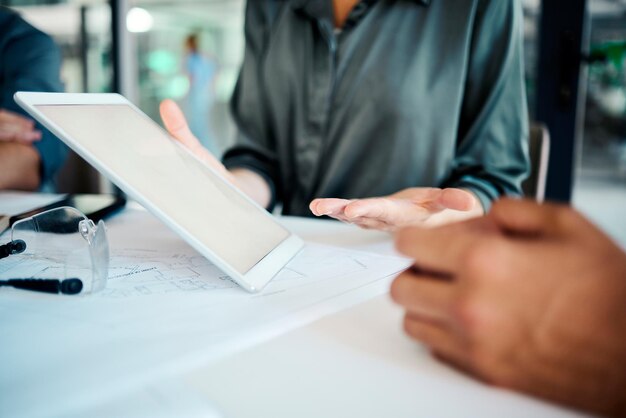 Midsection of businessman using mobile phone