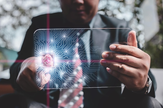 Photo midsection of businessman using technology in office