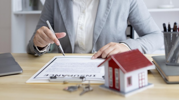 midsection of businessman working at desk in office
