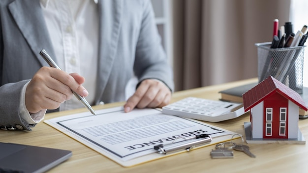 midsection of businessman working on table