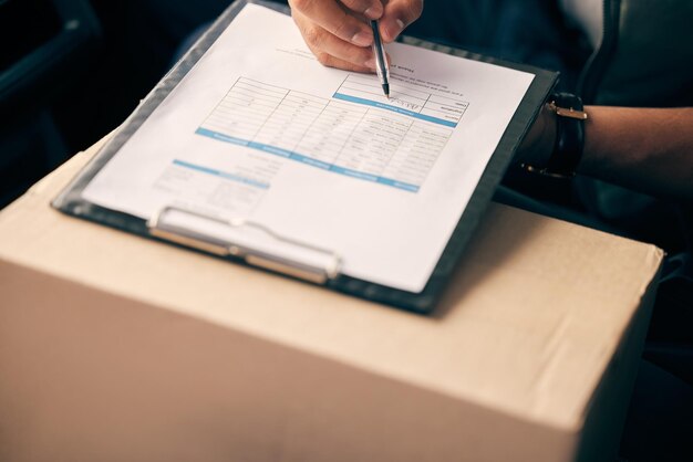 Midsection of businessman working on table