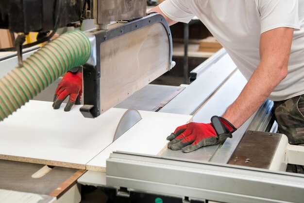 Photo midsection of carpenter working on table